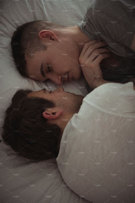 Gay Couple Sleeping Face To Face On Bed ~ Photos ~ Creative Market
