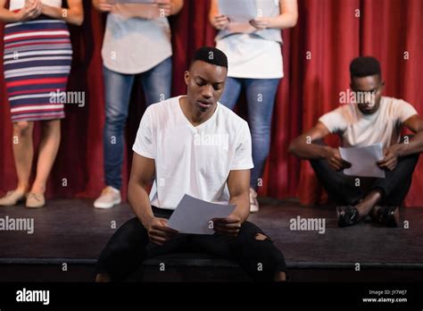 Actor Reading His Scripts On Stage In Theatre Stock Photo Alamy