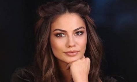 turkish actress demet Özdemir mirrors glamour in a stylish blacktop