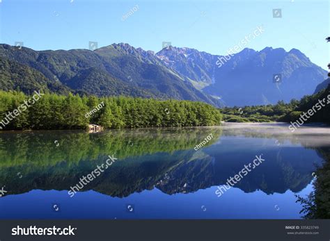 Mountains Reflected In The Lake Stock Photo 335823749 Shutterstock