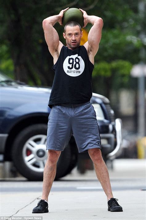Hugh Jackman Shows Off His Bulging Biceps As He Works Out In New York