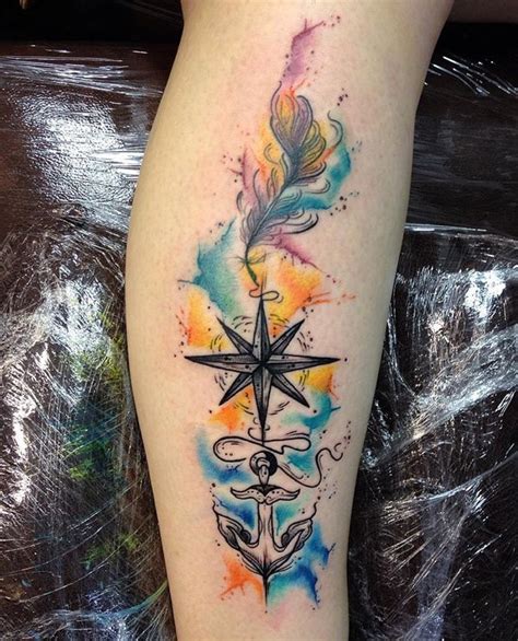 Nice Colored Big Tattoo On Leg With Star Anchor And Feather