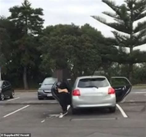 absolutely disgusting moment a driver catches a woman relieving herself in a car park daily