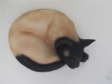 Your pet holds a special place in your heart. Dark Siamese Cat-Shaped Cremation Urn for Ashes