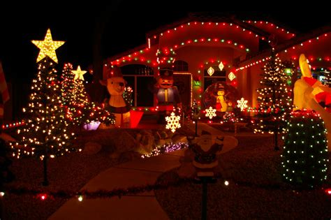 Christmas winter background with snow and shiny blurred lights. Christmas Lights On House Wallpaper | kentscraft