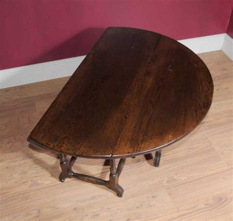 This table showcases wood grain and knots that add a rustic flair. Oak Gateleg Coffee Table Farmhouse Country Tables