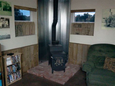 The flat bars will attach the tin ceiling tiles together and the copper couplings will be used to keep the ceiling tiles off the wall for air flow. stove heat shields - Google Search | Fireplace heat, Wood ...