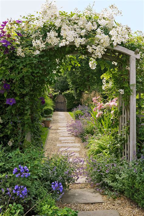 Discover top plants for your cottage garden. Country Cottage Garden - Love the stone embedded in the ...