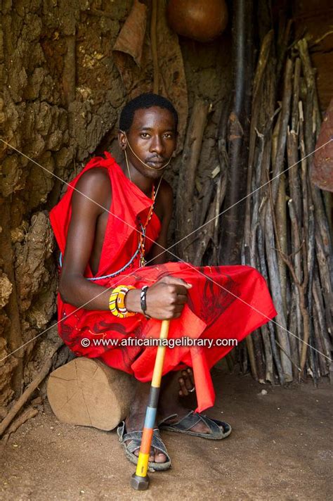 Photos And Pictures Of Kikuyu Woman Playing Music Ngomongo Village
