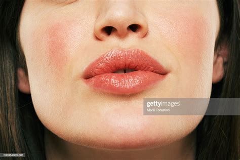 Young Woman Puckering Lips Closeup Photo Getty Images