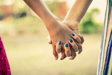 Two People Holding Hands · Free Stock Photo