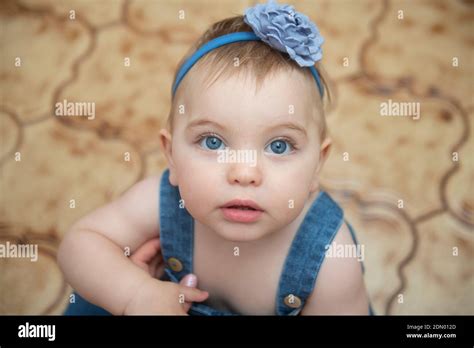 Little Baby Girl Newborn With Blue Eyes Stock Photo Alamy