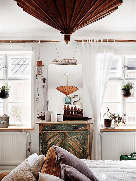 Branches in bottles and baskets. Inside a charming Finnish house by Krista Keltanen Photography