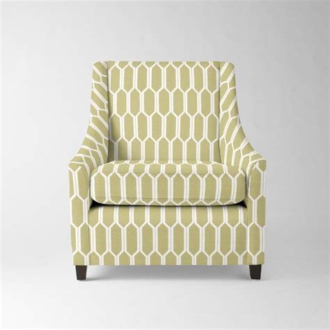 An Upholstered Chair With A Yellow And White Zigzag Pattern