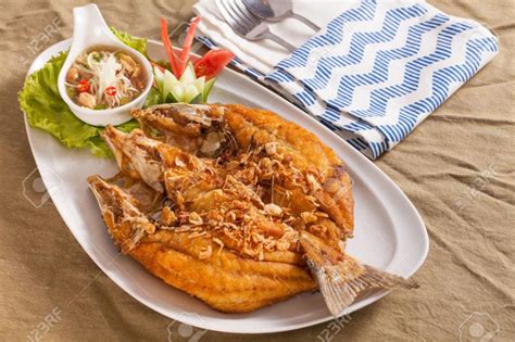 75059911 A Dish Of Crispy Thai Style Deep Fried Whole Sea Bass Fish