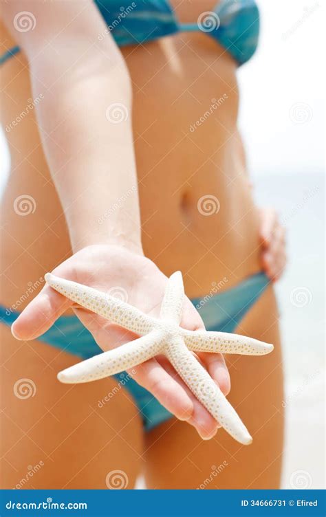 Woman With Starfish On The Beach Stock Image Image Of Summer Female