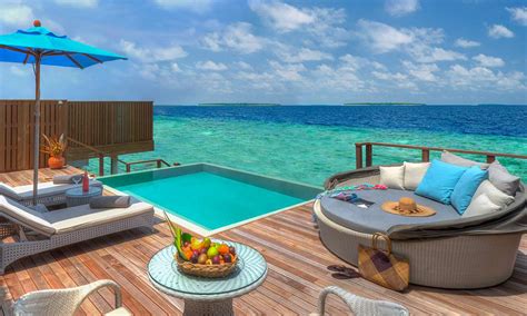 Dusit Thani Maldives Mudhdhoo Island Honeymoon Package Water Villa