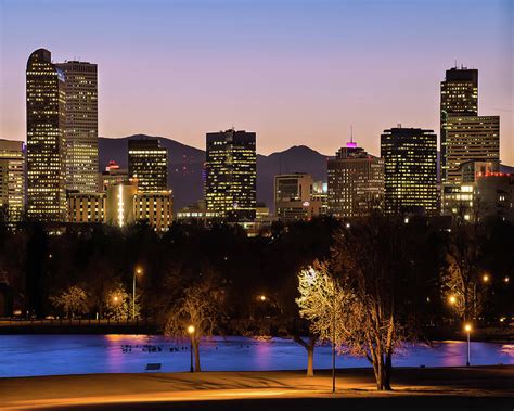 Denver Skyline And Rocky Mountains At Dawn From City Park Photograph By