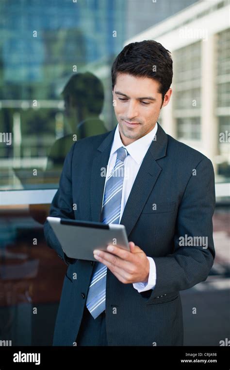 Businessman Using Tablet Computer Stock Photo Alamy