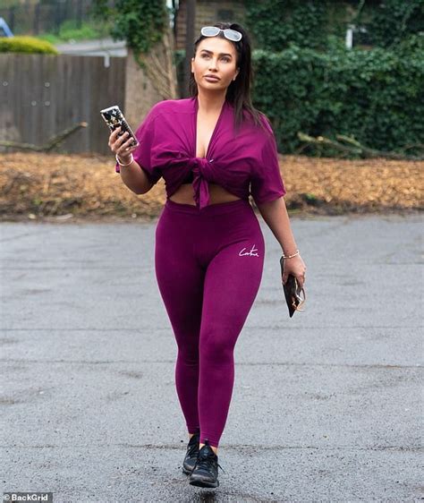 lauren goodger displays her voluptuous curves in a busty magenta co ord as she steps out for a