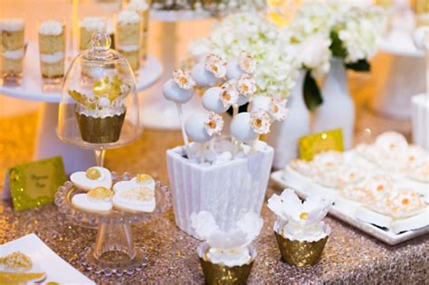 Elegant White And Gold Dessert Table