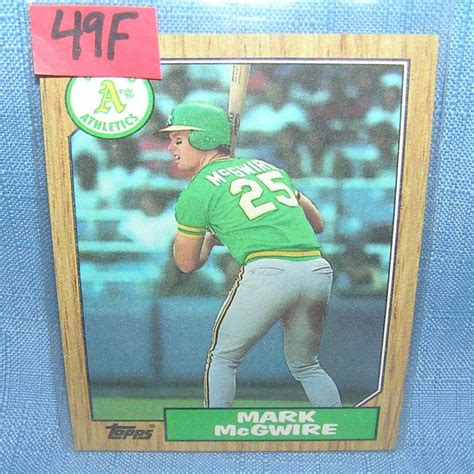 This is the first card. Lot - MARK MCGWIRE ROOKIE BASEBALL CARD