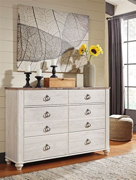 The bedroom is a cozy retreat where we can relax and unwind. Willowton Whitewash Dresser - SpeedyFurniture.com