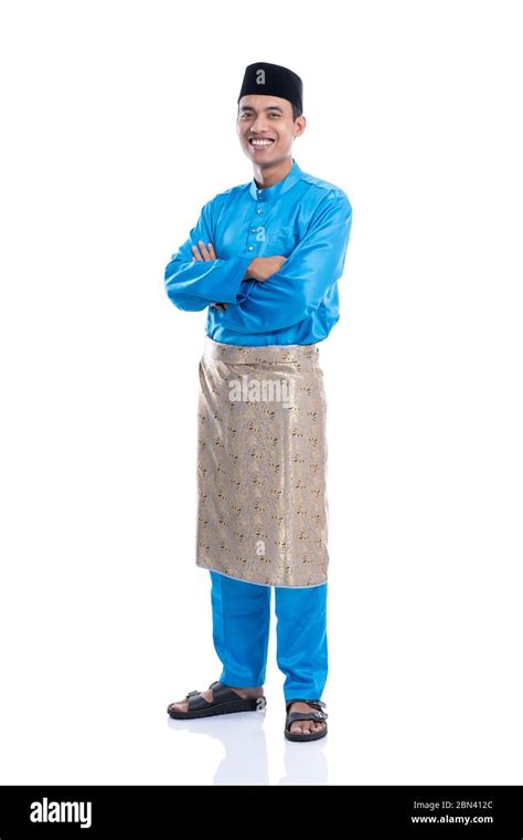 Full Lenght Portrait Of Malaysia Male With Blue Traditional Satin