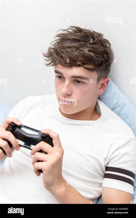 Teen Play Games Hi Res Stock Photography And Images Alamy