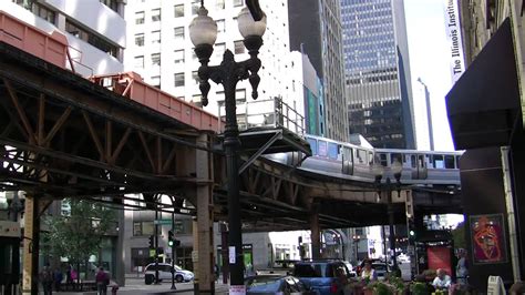 Informed and/or actively participating in something, such as an ongoing discussion or project, typically involving many people. Riding the Chicago Loop - YouTube