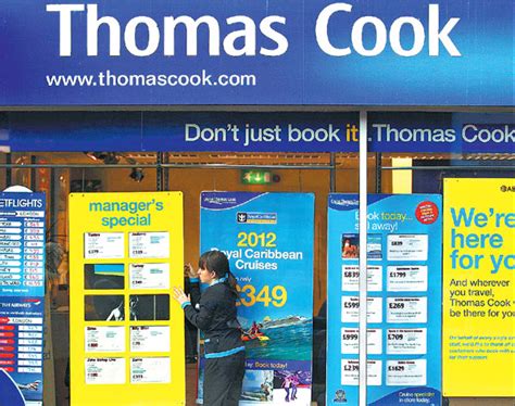 You just studied 9 terms! a worker changes the window display of thomas cook in loughborough central england provided to ...