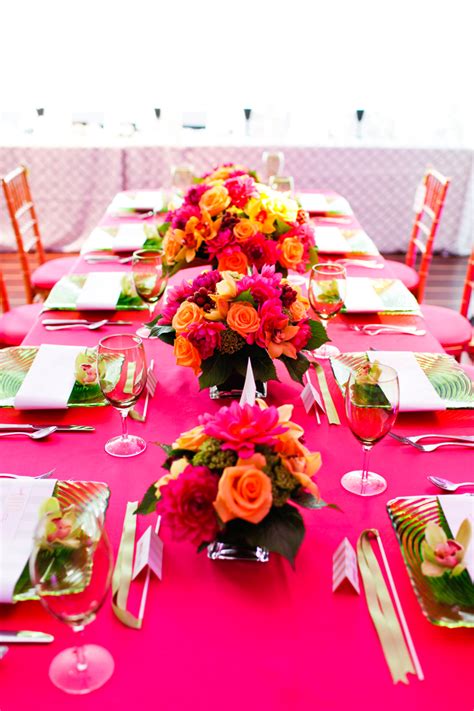 Fun summery tablescape. Fuschia and orange with pops of green. | Orange