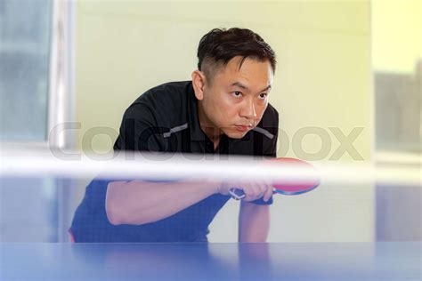 Ping Pong Table Male Playing Table Tennis With Racket And Ball In A