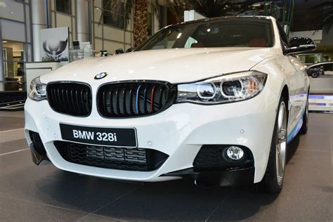 The bmw 328i is a road car produced by bmw. BMW 3-Series GT Spiced Up with M Performance Parts | Carscoops