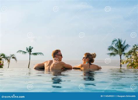 Happy Couple In Infinity Pool Stock Image Image Of Indonesia Maldives 114549551