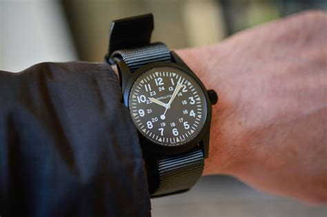 38mm matt stainless steel case, three hand display, dark dial with light, luminescent numerals, indexes showing hours and minutes, durable nato strap: Hamilton Khaki Field Mechanical 38mm Black PVD in 2020 ...