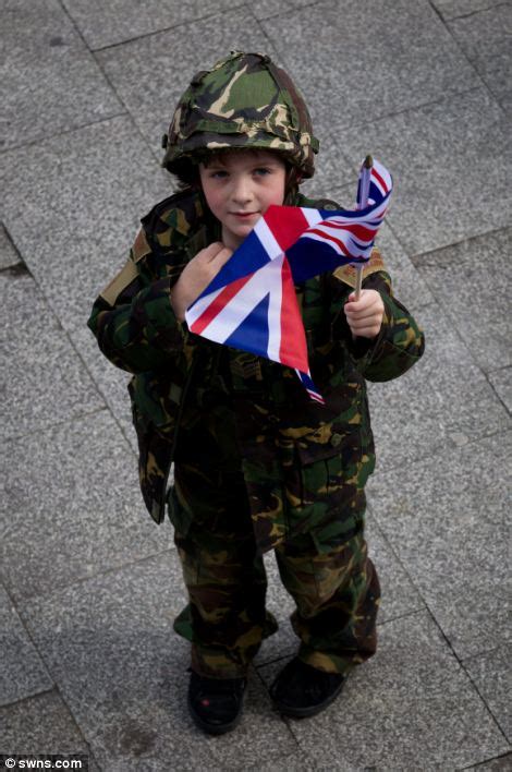 Thousands Line The Streets Of Royal Marines Home Town To Mark Heroes Return From Final Tour Of