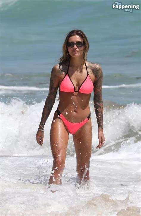 Sophia Thomalla Enjoys A Day At The Beach Rocking A Sexy Pink Bikini 25 Photos