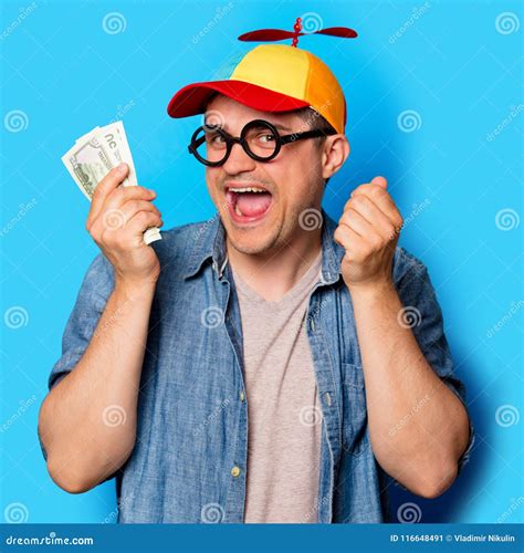 Young Nerd Man With Noob Hat Holding A Money Stock Image Image Of