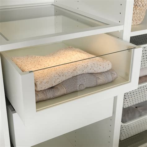 That's why a safety fitting is included so that you can attach the wardrobe to the wall. KOMPLEMENT Drawer with glass front, white, 19 5/8x22 7/8 ...