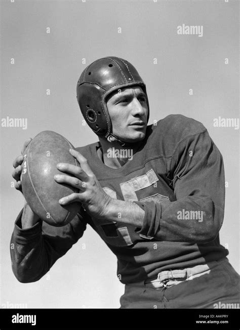 1940s 1950s Man Football Quarterback About To Throw A Pass Stock Photo