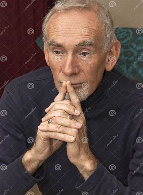 Senior Man Leaning On His Hands Deep In Thought Stock Photo Image Of