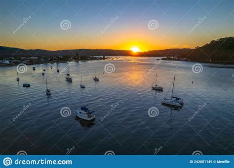 Aerial Sunrise Waterscape With Boats And Clear Skies Stock Image