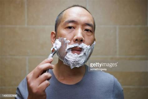 Asian Male Shaving Beard Photos And Premium High Res Pictures Getty