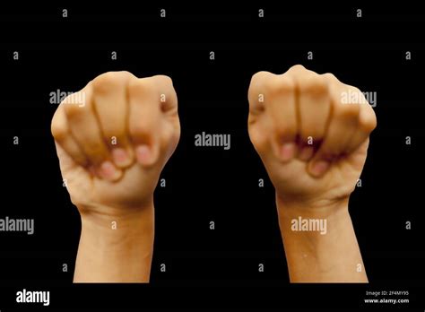 Mushti Mudra Demonstrated By Male Hands Isolated On Black Background