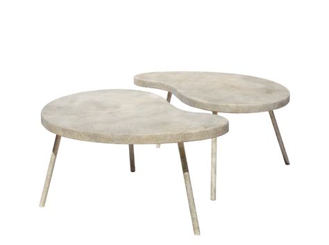 Fabricated in a lightweight cast composite resin with aluminum legs. Ying Yang Coffee Table or Side Table | Inner Gardens