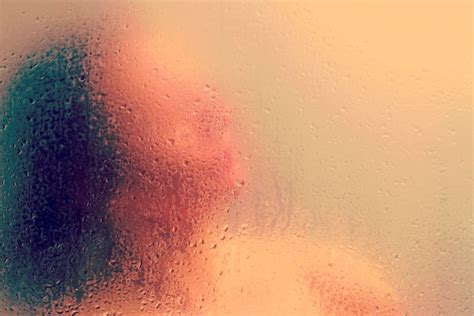 Premium Photo Beautiful Woman In The Shower Behind Glass With Drops