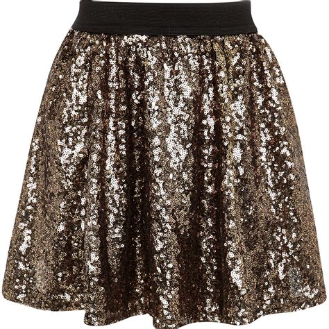 Shop hundreds of favorite brands. River island Girls Dark Gold Sequin Tutu Skirt in Gold | Lyst