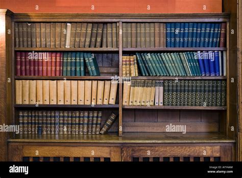 Book Shelves With Old Leather Bound Books Stock Photo Alamy