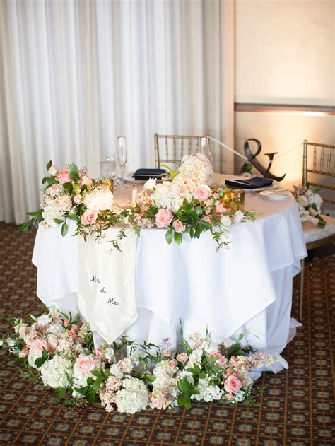 This is a set of large dusty blue floral arrangement centerpieces with a flowy chiffon tablecloth in white color, ready to use for wedding sweetheart table decorations. sweetheart table | Sweetheart table, Table, Table decorations